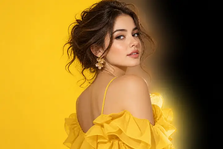 A fashion portrait transitioning from a bold yellow backdrop to a transparent checkerboard preview.